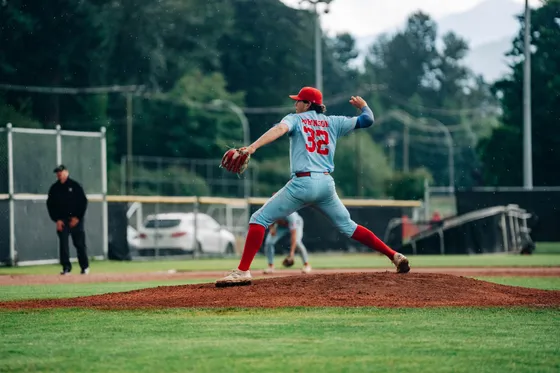 An Abbotsford Cardinals pitcher seen from the side.