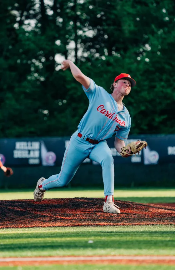 An Abbotsford Cardinals pitcher in a powder blue uniform.